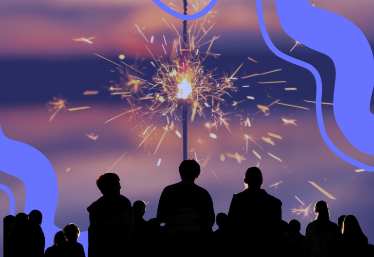 Stort tomtebloss. Människr i förgrunden som tittar mot tomteblosset.