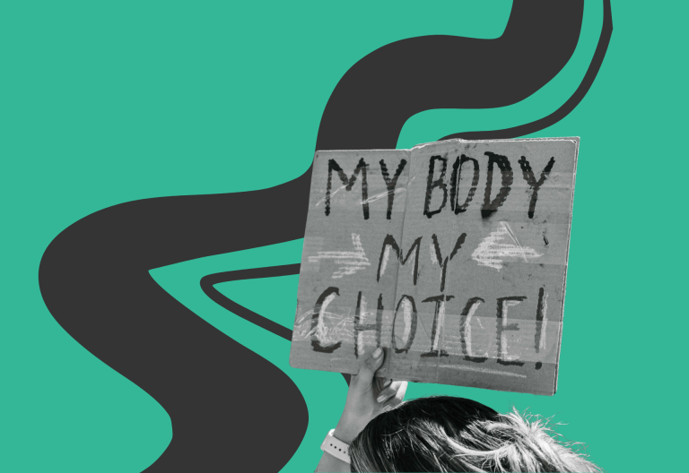 Demonstrant håller upp ett plakat med texten My body my choice