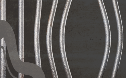 Svart bakgrund, galler som är lite uppbrutet